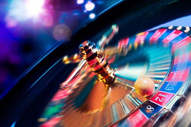 Wild Coaster slot interface on kansas4d showing five reels, carnival theme, and control buttons